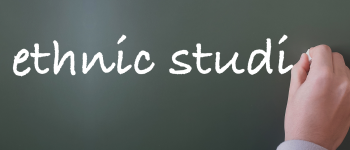Image - hand on chalkboard and text